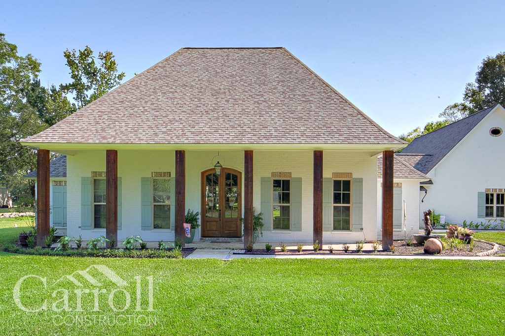 Front Elevation Custom home in East Feliciana by Carroll Construction for the Signorion Family. Country French Home.