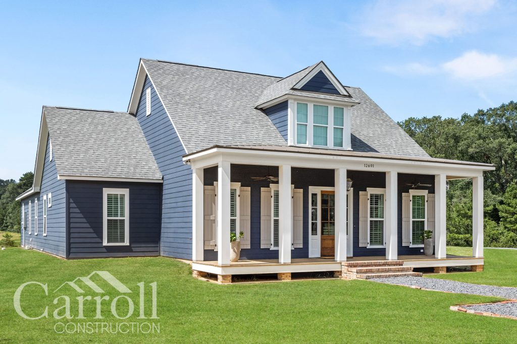 Front Elevation Custom home in East Feliciana by Carroll Construction for the Carroll Family. Acadian Farmhouse.