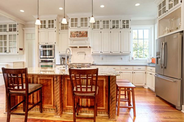 Customized Liberty Plan – Kitchen with reclaimed pine barnwood island and full-height cabinets with glass