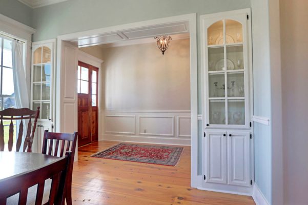 Customized Liberty Plan – Dining room view toward built-in china cabinets and foyer